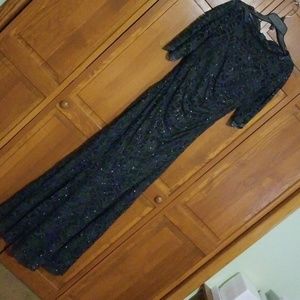 Lace overlay pewter color long formal gown.